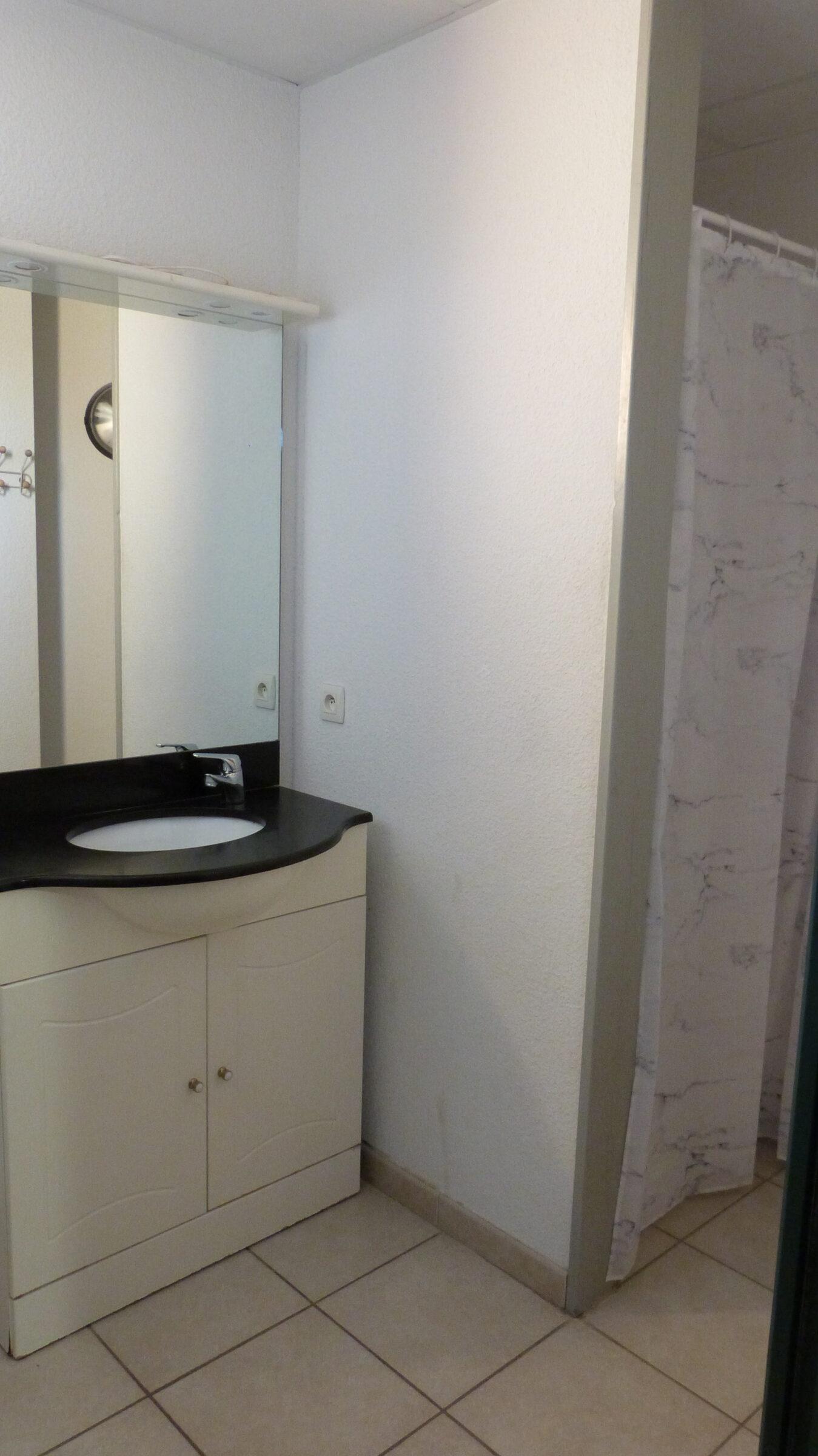 Salle de douche à l’étage
